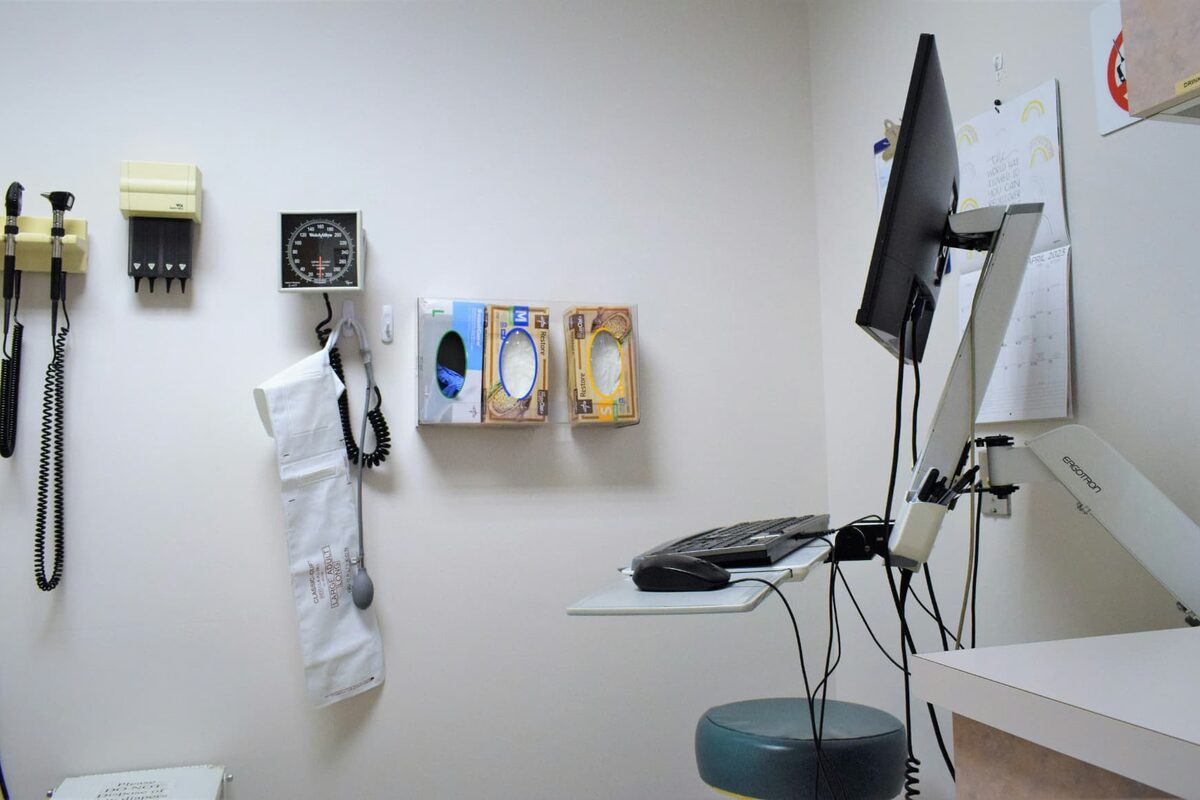 A bright medical or dental practice operatory prepared for the day.